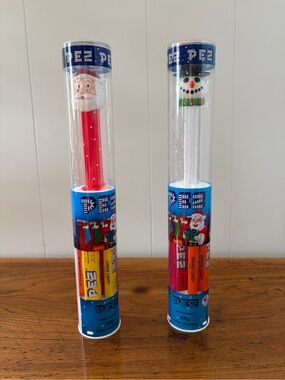 2 New unopened PEZ Holiday Candy Dispensers- Santa Red & Snowman White